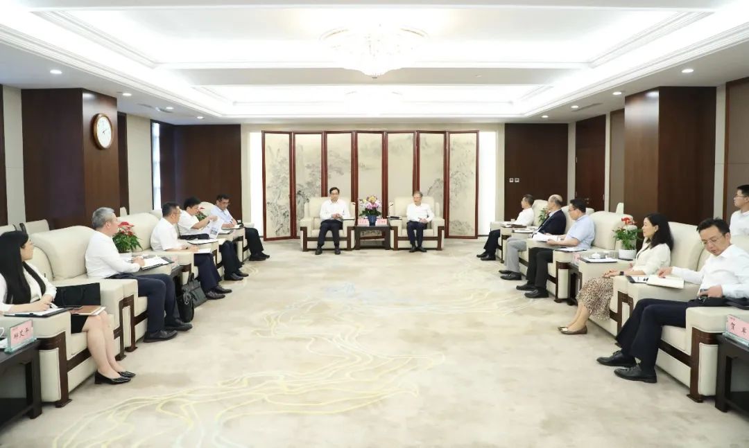 		周育先造访国家开发投资集团_责任动态_尊龙凯时集团有限公司	
