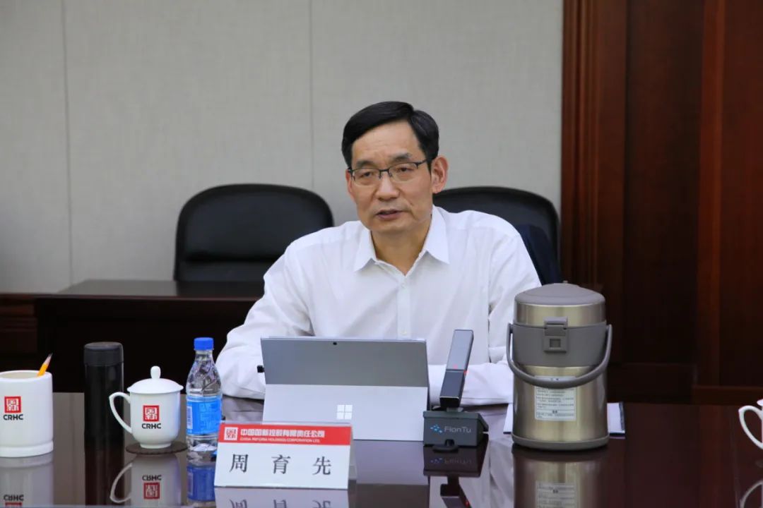 		周育先一行会见中国国新_尊龙凯时要闻_尊龙凯时集团有限公司	
